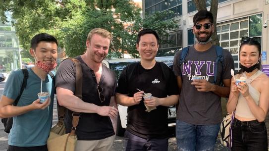 students enjoying ice cream during graduate orientation