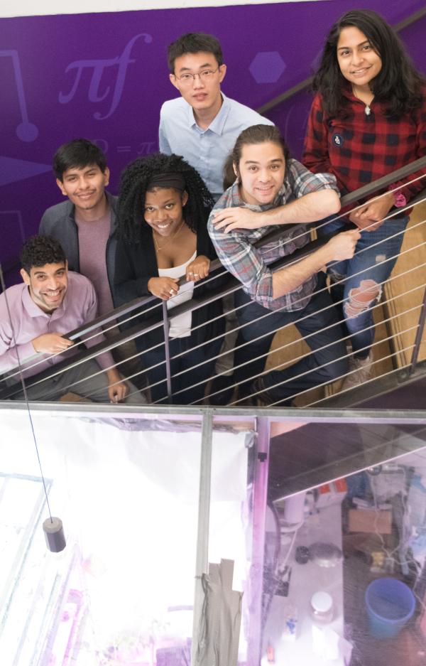 diverse group of students on MakerSpace stairwell