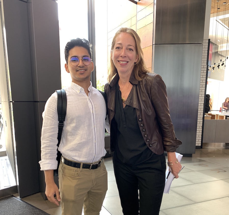 Karine posing with student at Career Fair