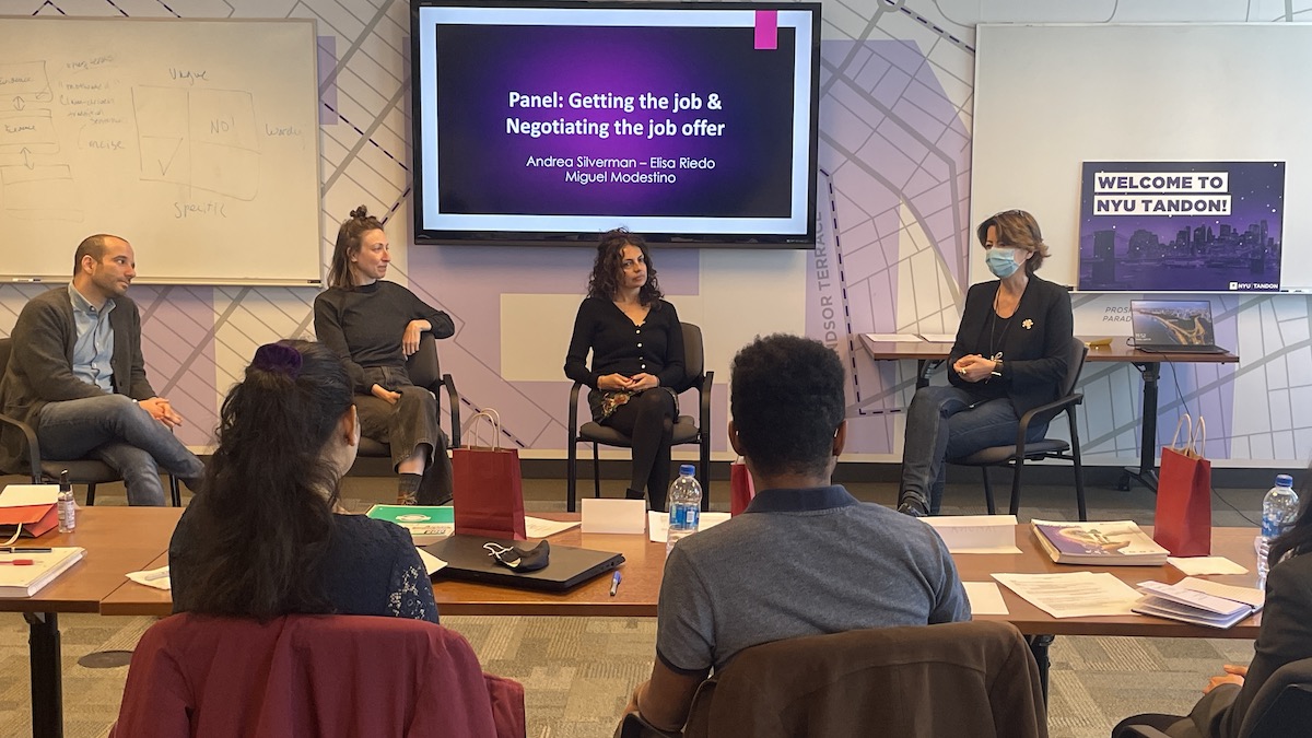 Panel of Tandon faculty sitting in font of screen "Getting the job & negotiating the job offer"